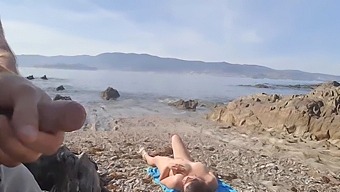 A Nudist Milf Receives A Public Flash From An Exhibitionist On The Beach